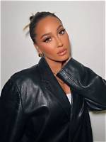 Adrienne Bailon Explains Why She Kept Her Baby News Quiet