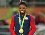 Unveiling the Wealth of a Gymnast: Simone Biles Net Worth
